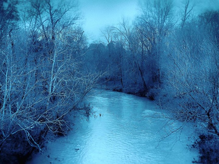 A snowy creek in bright blue